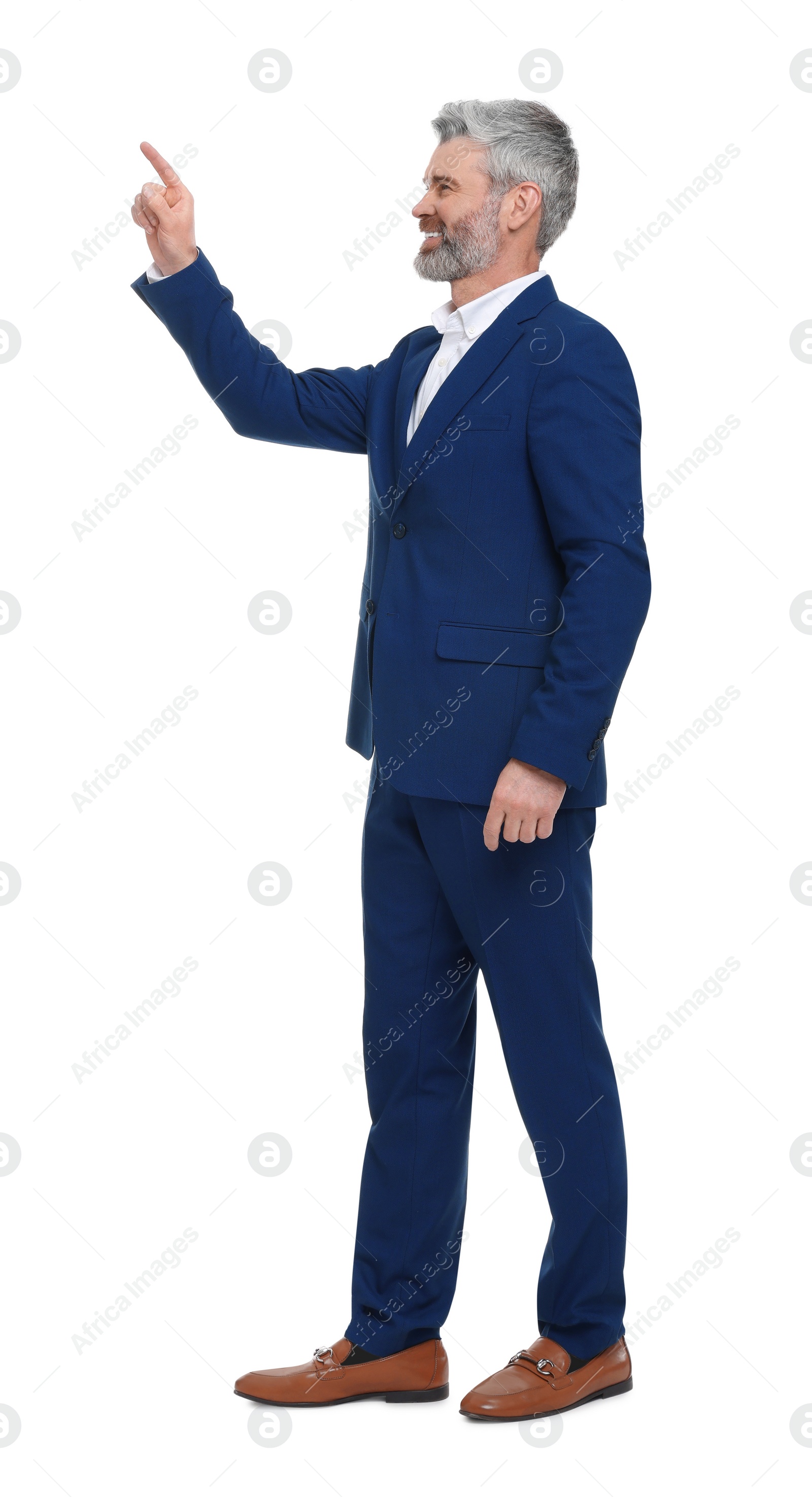 Photo of Mature businessman in stylish clothes posing on white background