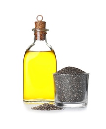 Bottle of chia oil and glass with seeds on white background