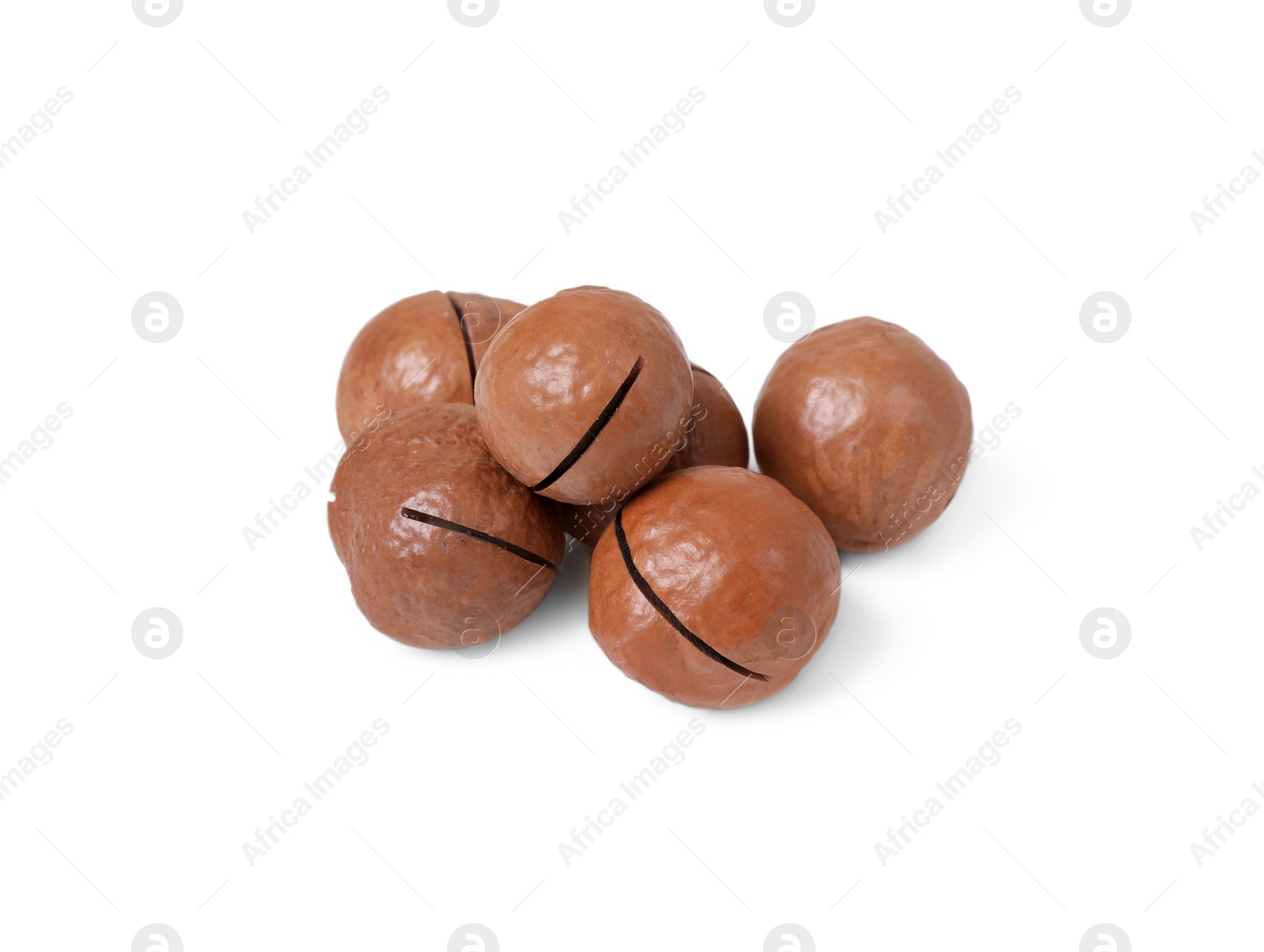 Photo of Delicious organic Macadamia nuts isolated on white