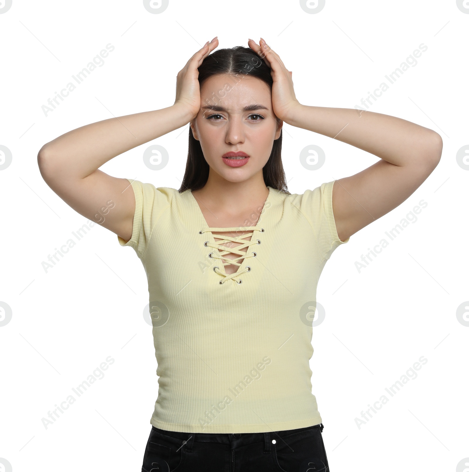 Photo of Young woman suffering from headache on white background. Cold symptoms