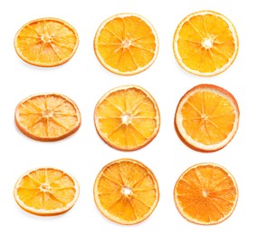 Many dry orange slices on white background