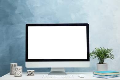 Photo of Comfortable workplace with modern computer on table