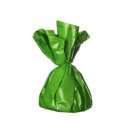 Photo of Delicious candy in green wrapper isolated on white