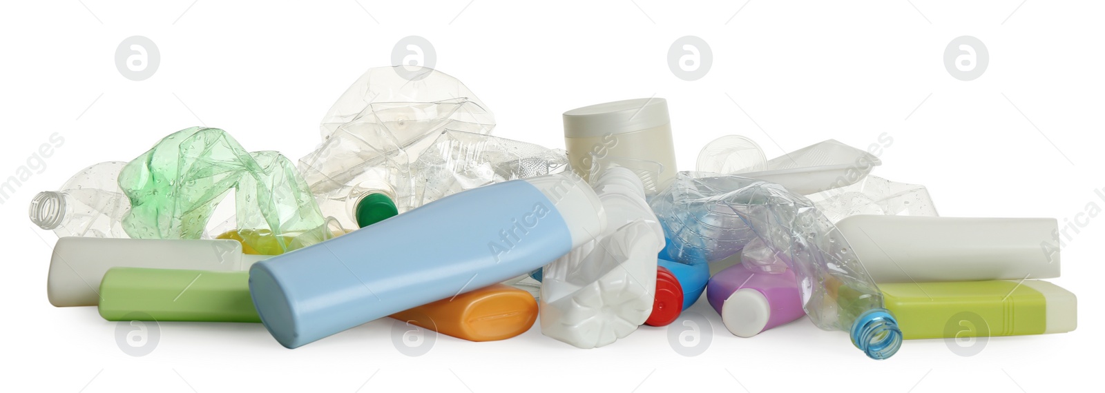 Photo of Pile of plastic garbage on white background