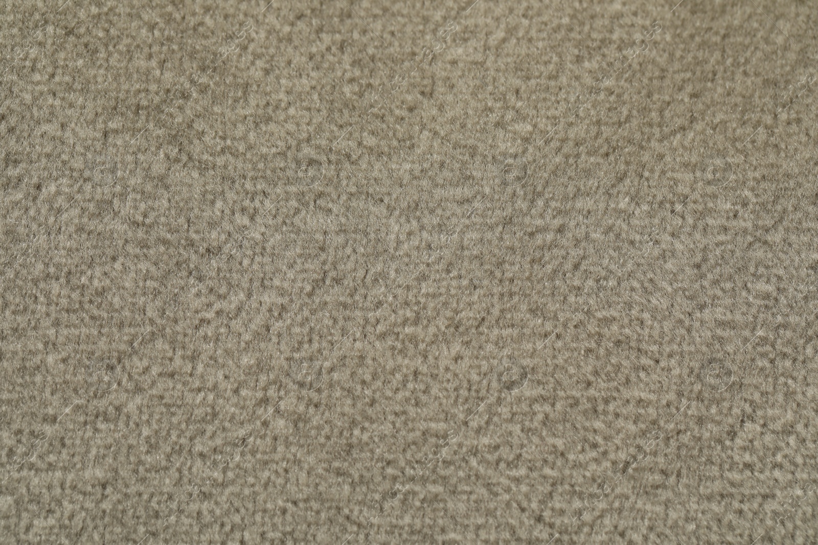 Photo of Texture of soft beige fabric as background, top view