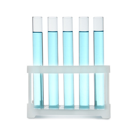 Photo of Test tubes with light blue liquid in rack isolated on white