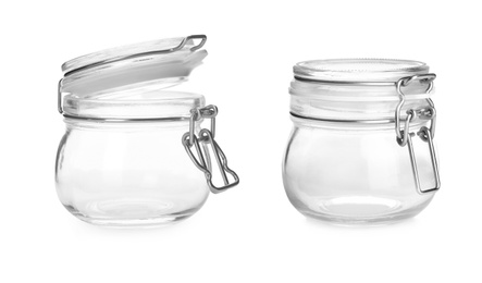 Image of New empty glass jars on white background