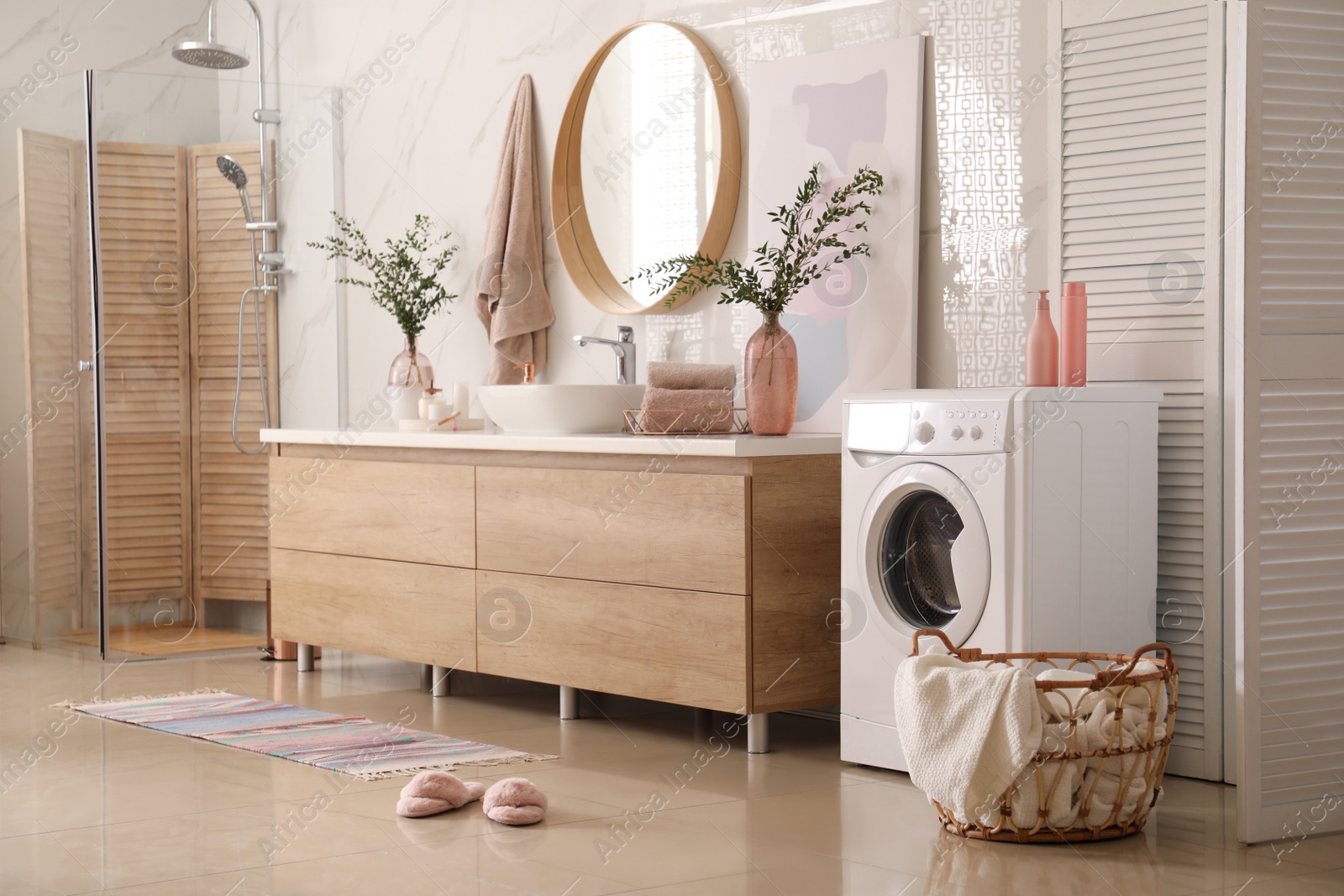 Photo of Modern bathroom interior with stylish mirror and vessel sink