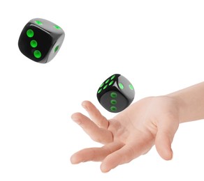 Woman throwing black dice on white background, closeup