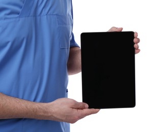 Photo of Doctor holding blank tablet on white background, closeup. Space for design