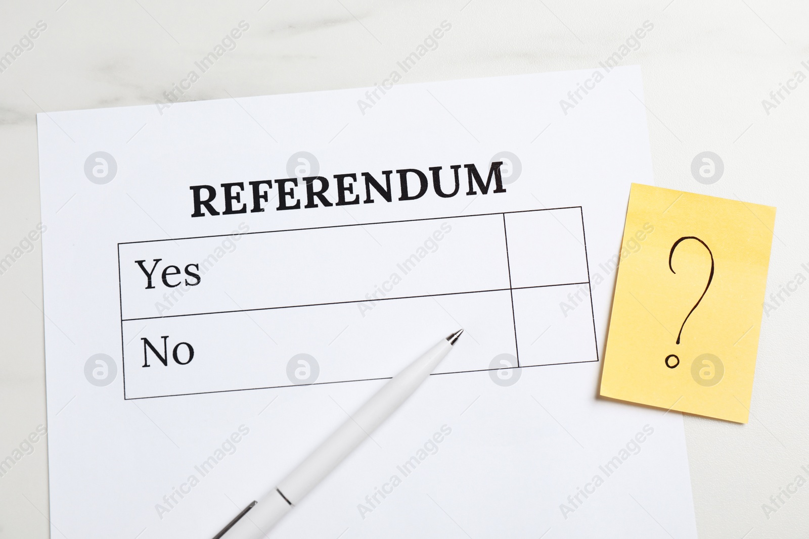 Photo of Referendum ballot, pen and sticky note with question mark on white marble table, flat lay