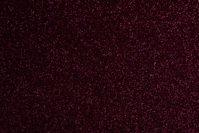 Beautiful shiny burgundy glitter as background, closeup