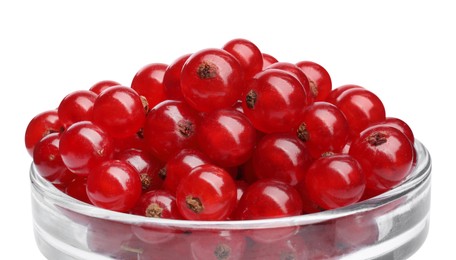Photo of Tasty ripe redcurrants in glass bowl isolated on white
