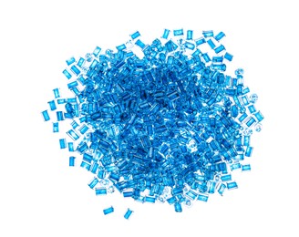 Photo of Pile of light blue beads on white background, top view