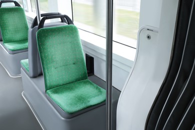 Public transport interior with comfortable green seats