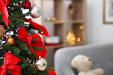 Christmas tree with stylish decor indoors, closeup