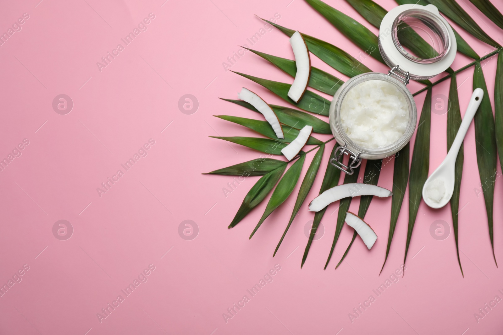 Photo of Flat lay composition with coconut oil on color background. Healthy cooking