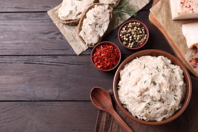 Delicious lard spread served on wooden table, flat lay. Space for text