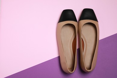 Photo of Pairnew stylish square toe ballet flats on colorful background, flat lay. Space for text