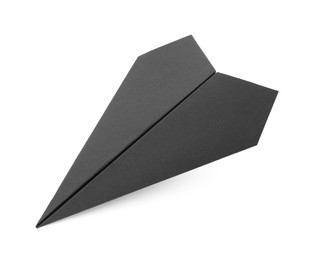 Photo of Handmade black paper plane isolated on white