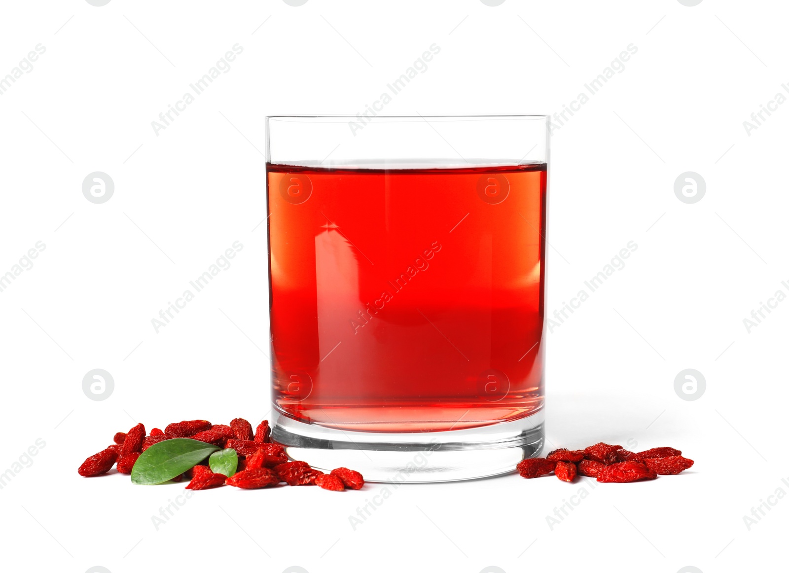 Photo of Healthy goji juice in glass with berries on white background