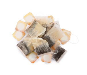 Photo of Used tea bags on white background, top view