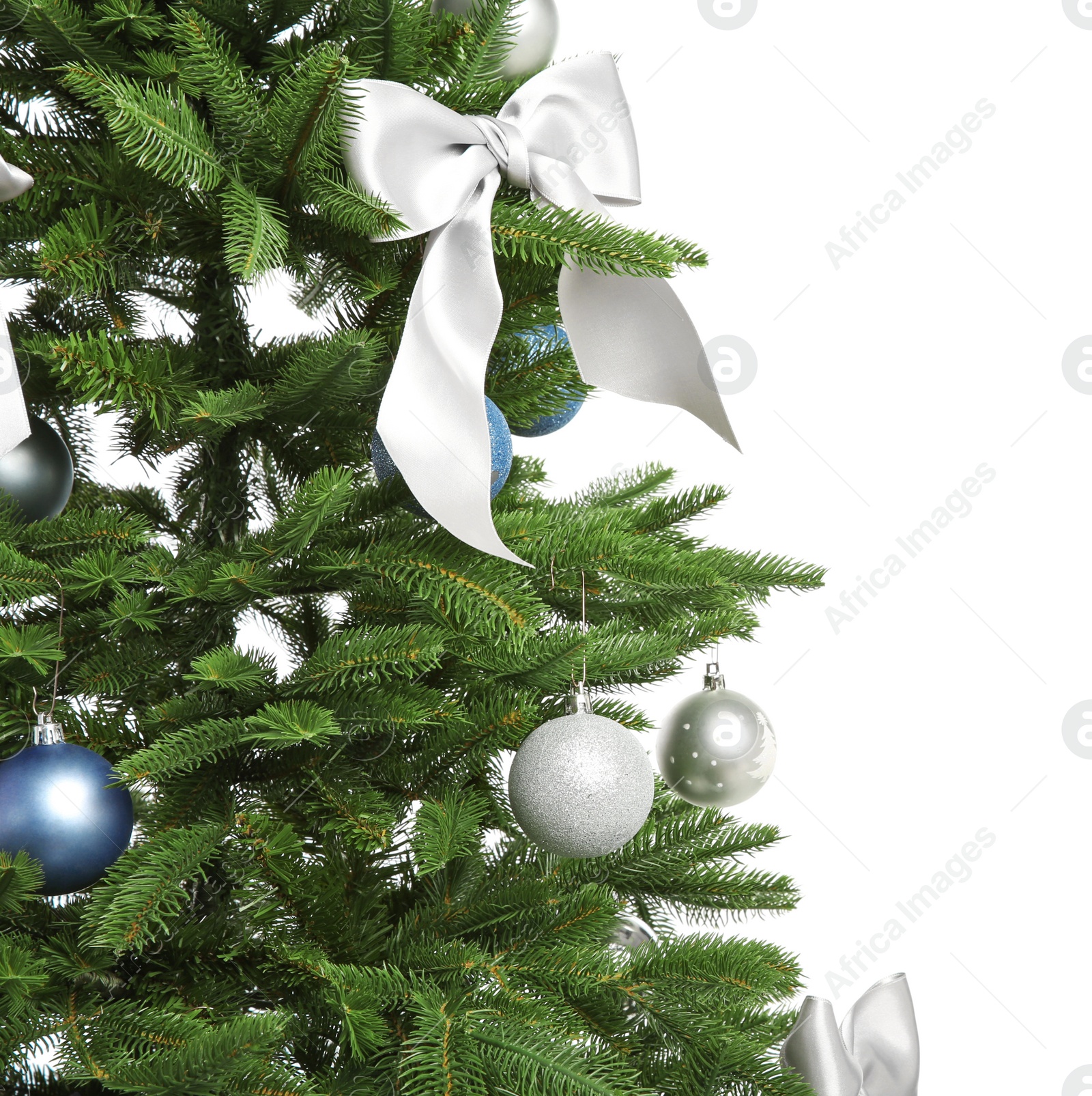 Photo of Beautifully decorated Christmas tree on white background, closeup