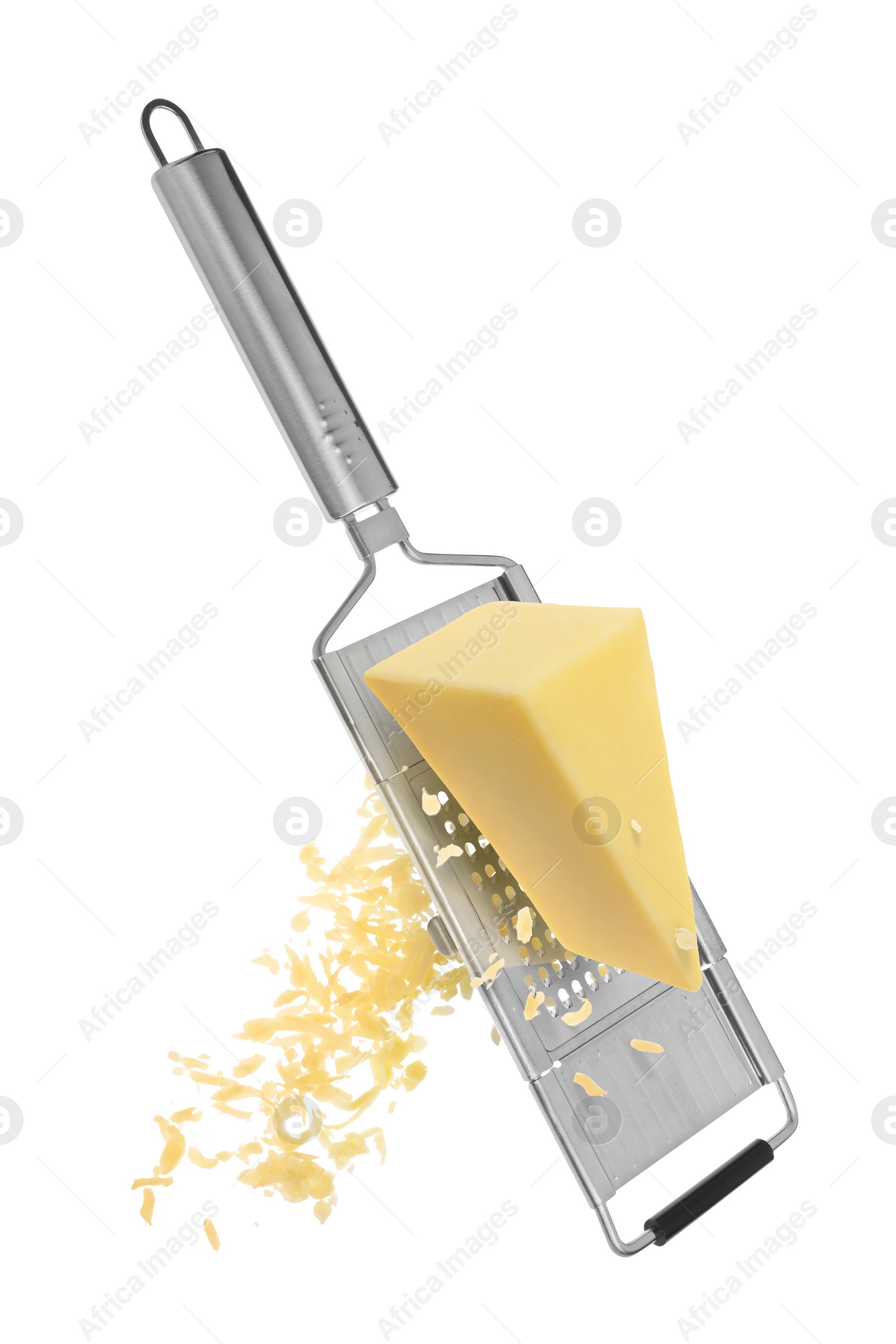 Image of Grating cheese with hand grater in air on white background