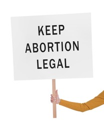 Woman holding placard with phrase Keep Abortion Legal on white background, closeup. Abortion protest