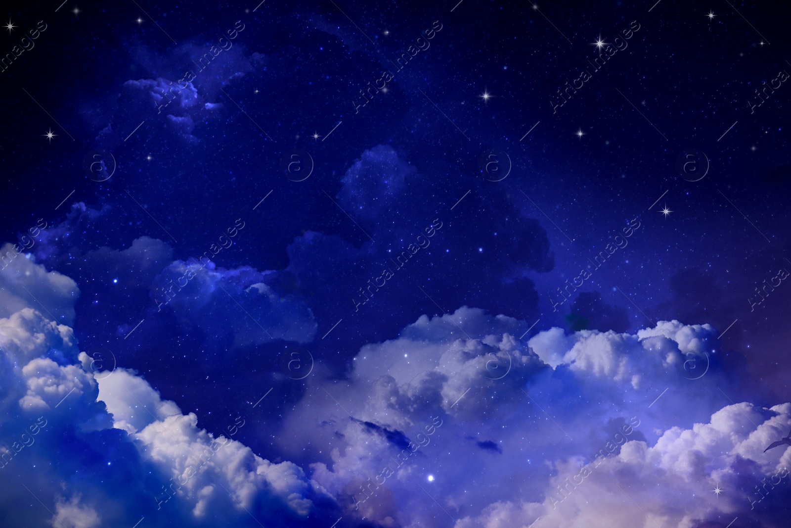 Image of Beautiful view of night sky with clouds and stars