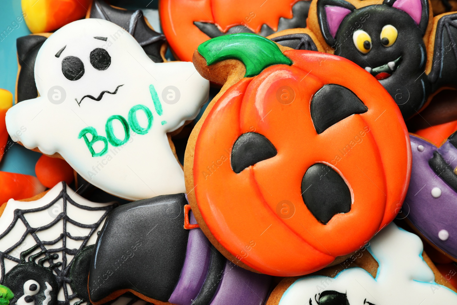 Photo of Closeup view of tasty Halloween cookies as background