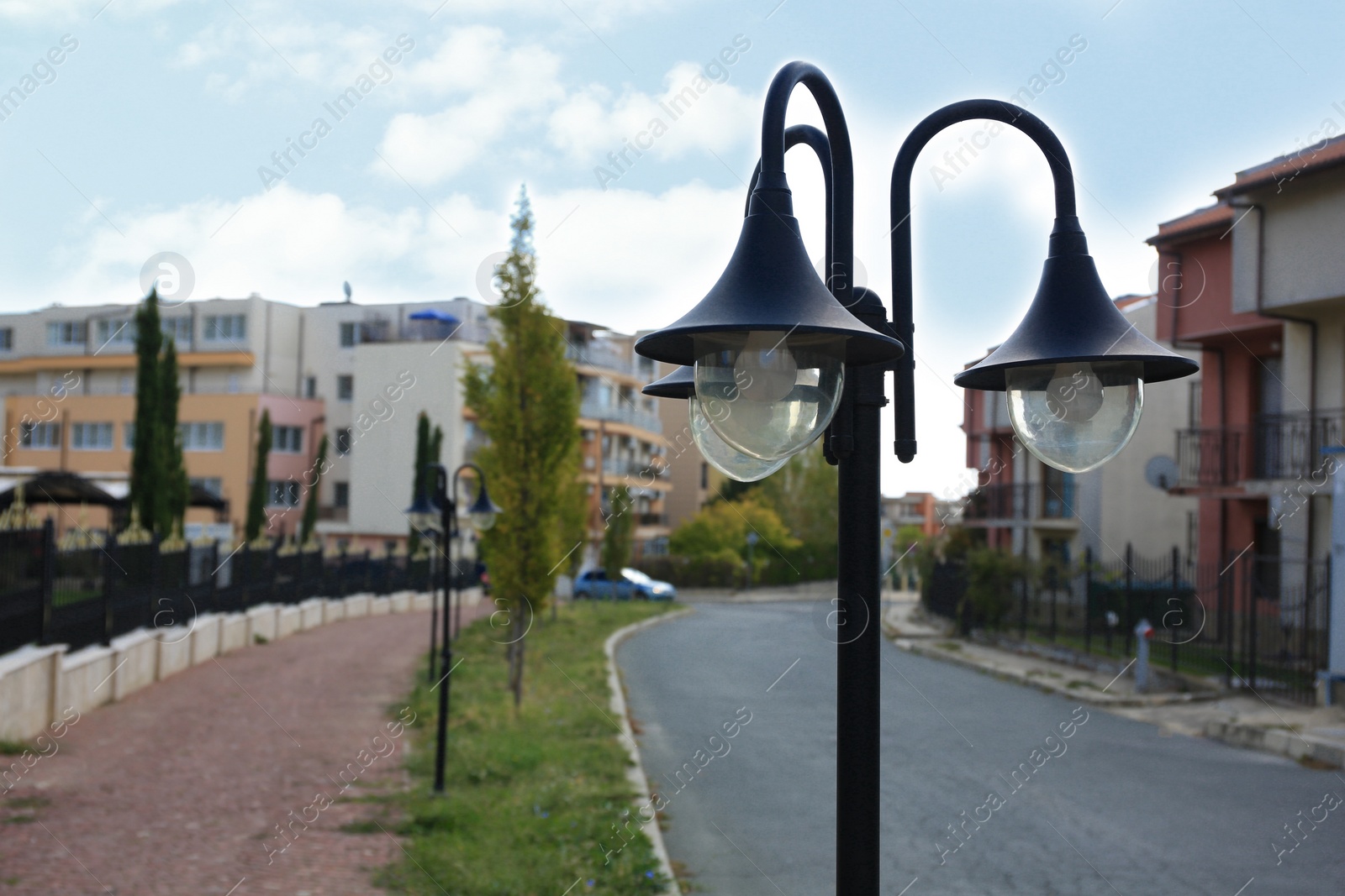Photo of Beautiful vintage street light in city on autumn day