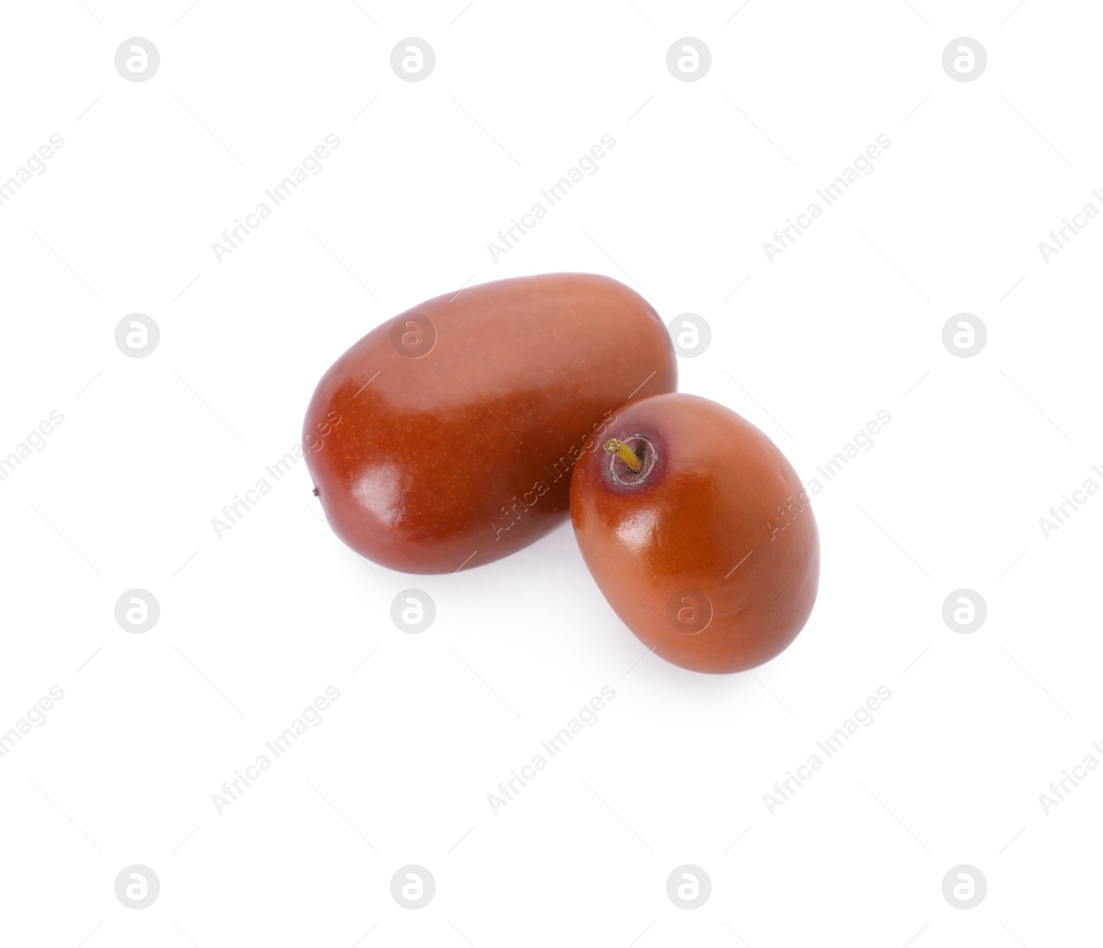 Photo of Two ripe red dates on white background, top view