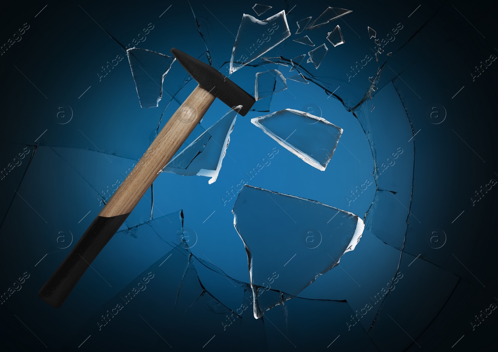 Image of Hammer breaking up glass against black background