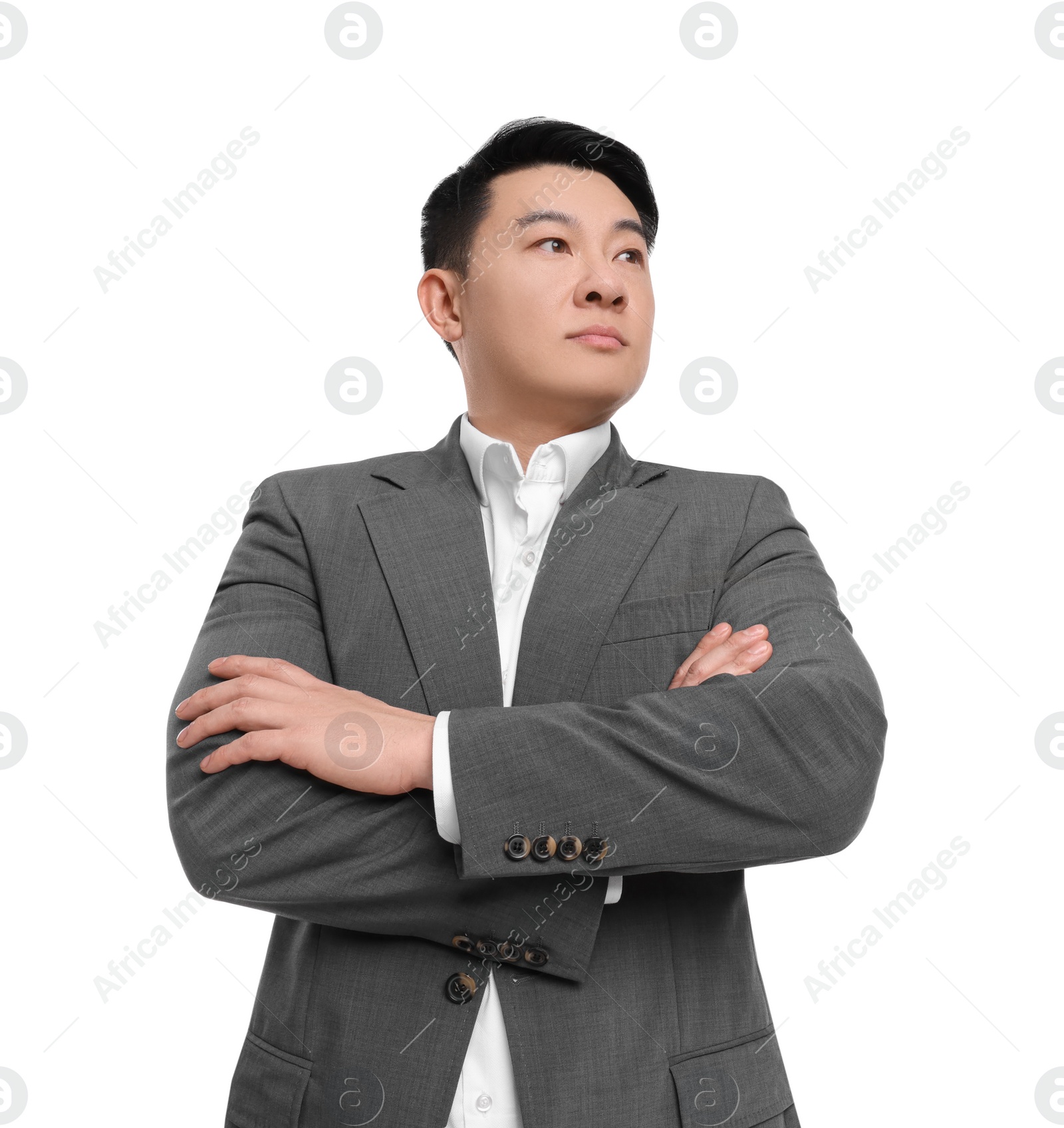 Photo of Businessman in suit posing on white background