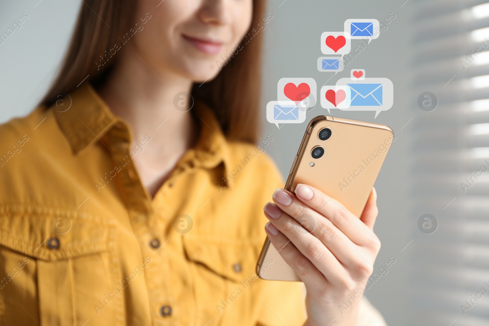 Image of Young woman using smartphone at home, closeup. Social media