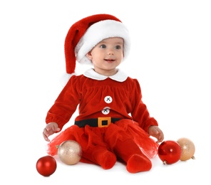 Photo of Cute little baby wearing festive Christmas costume on white background