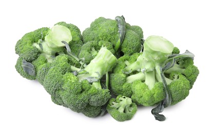 Photo of Pile of fresh raw green broccoli isolated on white