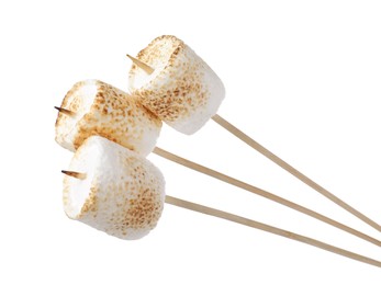 Sticks with roasted marshmallows on white background