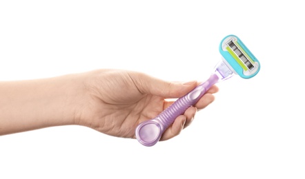 Woman holding razor on white background, closeup