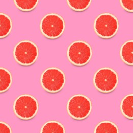 Image of Many fresh ripe slices of grapefruits on pink background, flat lay. Seamless pattern design