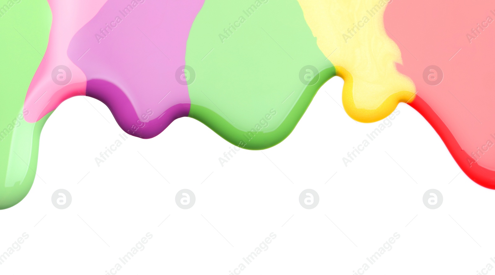 Photo of Colorful nail polishes spilled on white background