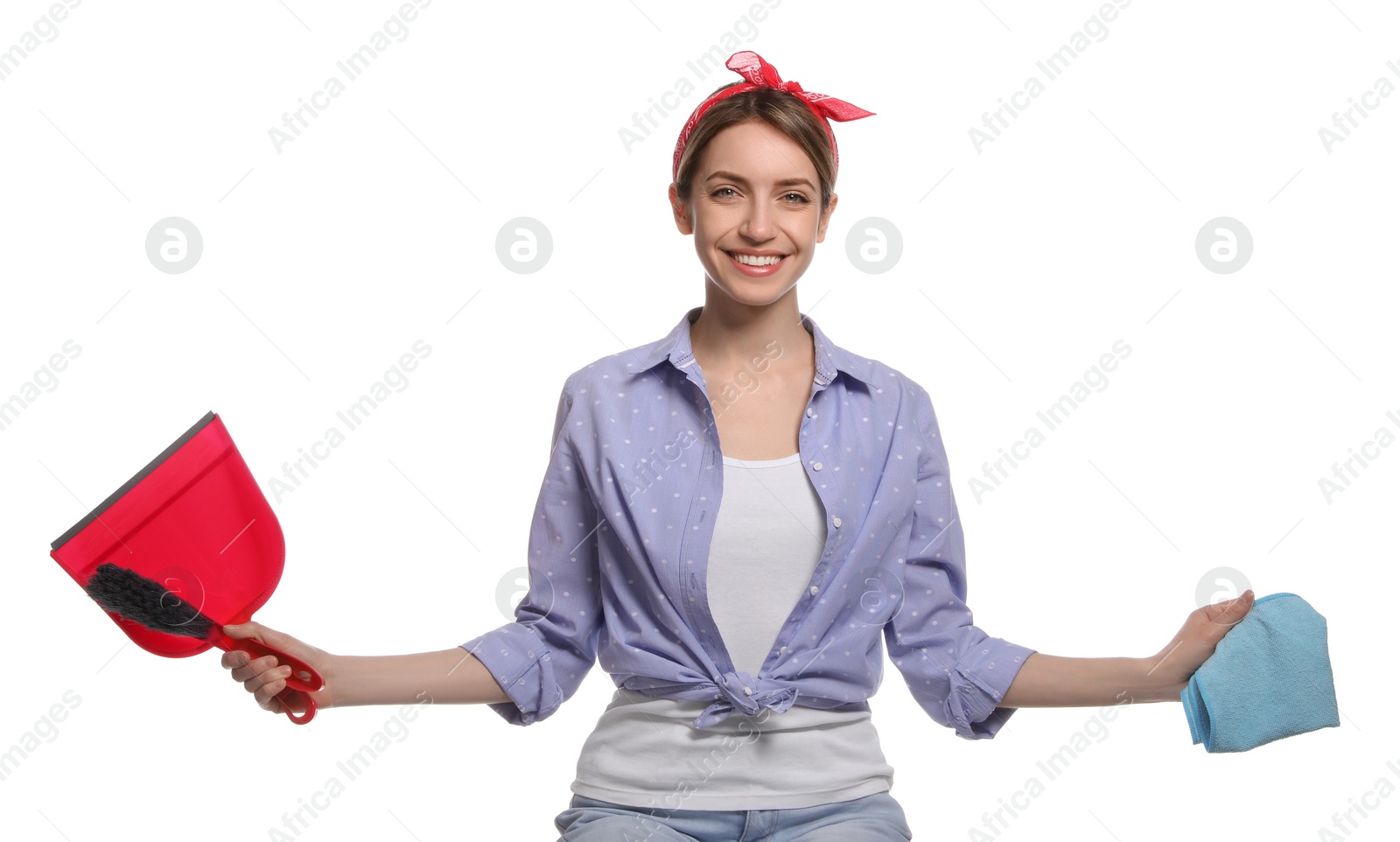 Photo of Young housewife with dustpan, brush and rag on white background