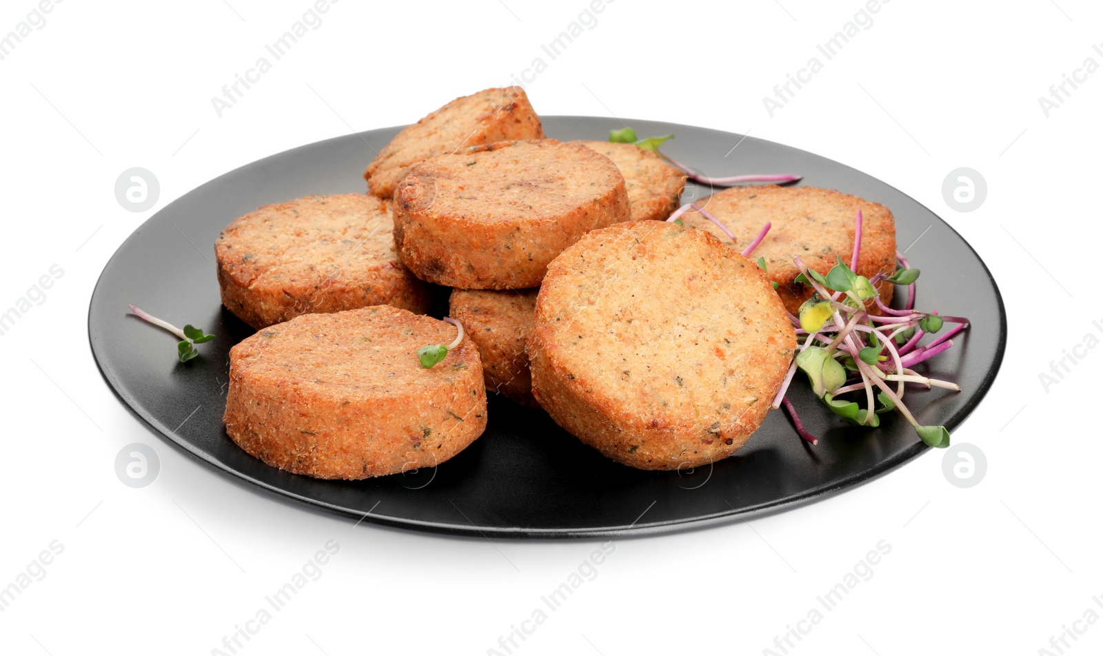 Photo of Plate of delicious vegan cutlets and microgreens isolated on white