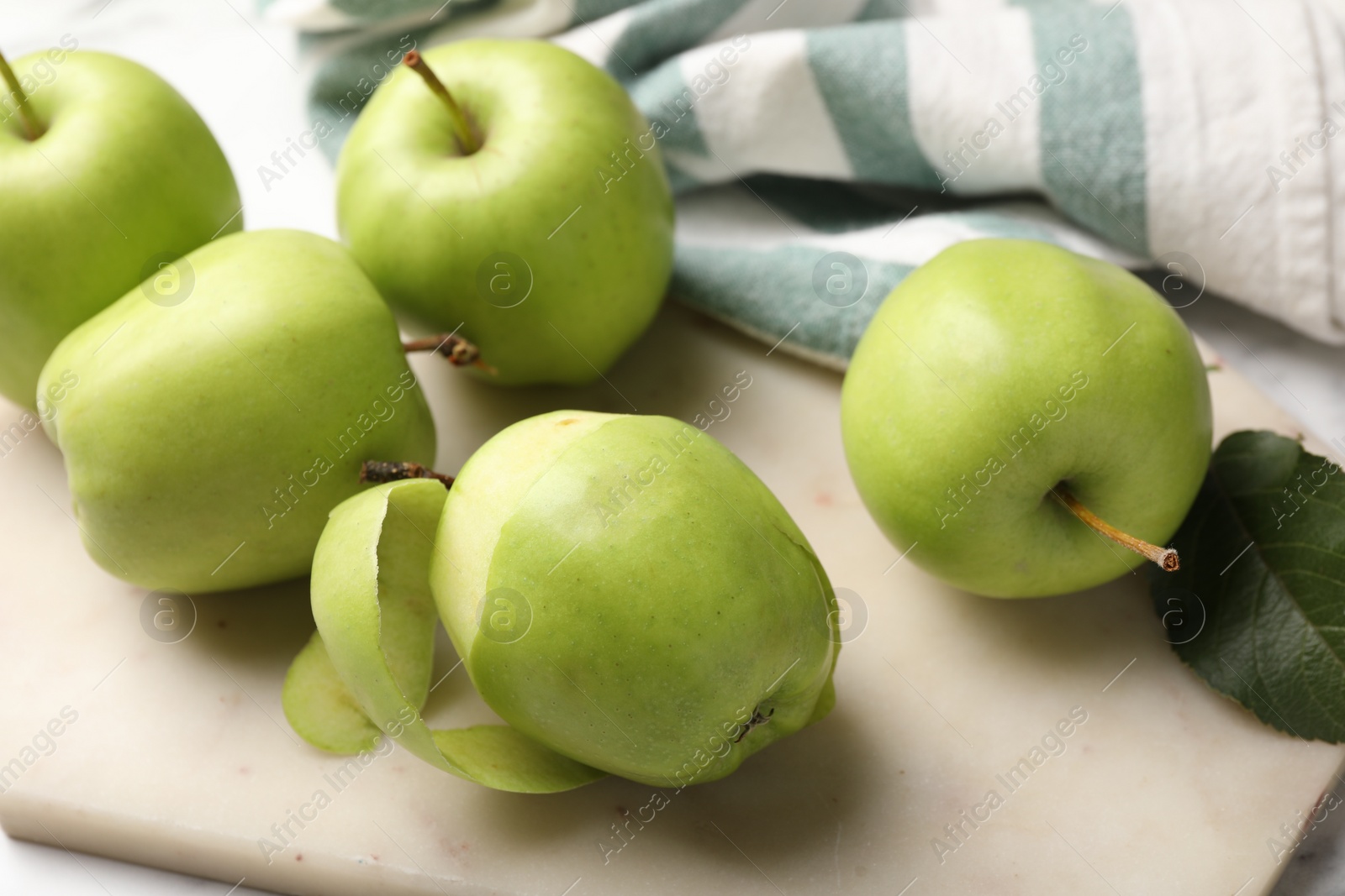 Photo of Ripe green apples on table, closeup view