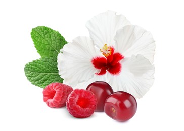 Image of Beautiful hibiscus flower, fresh tasty raspberries, cherries and mint on white background