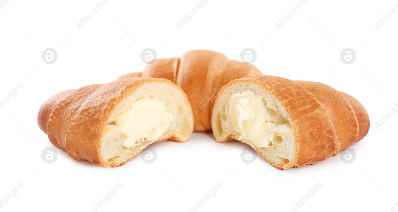 Photo of Delicious croissants with cream on white background