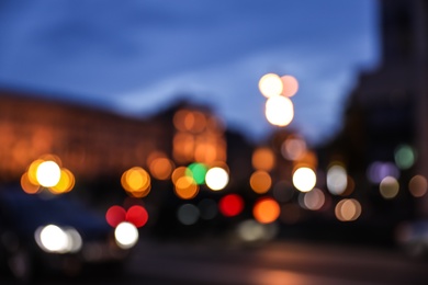 Blurred view of modern city at evening. Bokeh effect