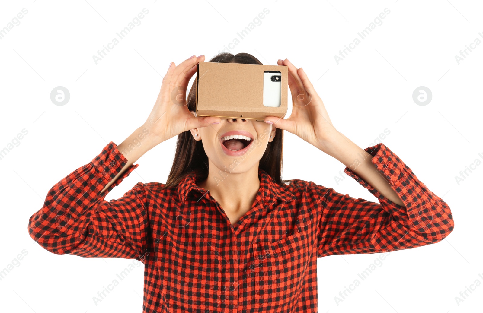 Photo of Young woman using cardboard virtual reality headset, isolated on white