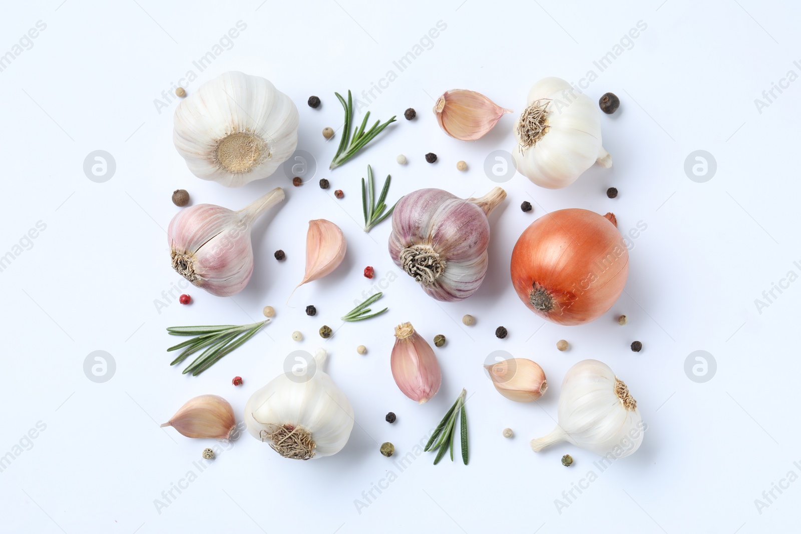 Photo of Fresh garlic, onion, rosemary and peppercorns on white background, flat lay